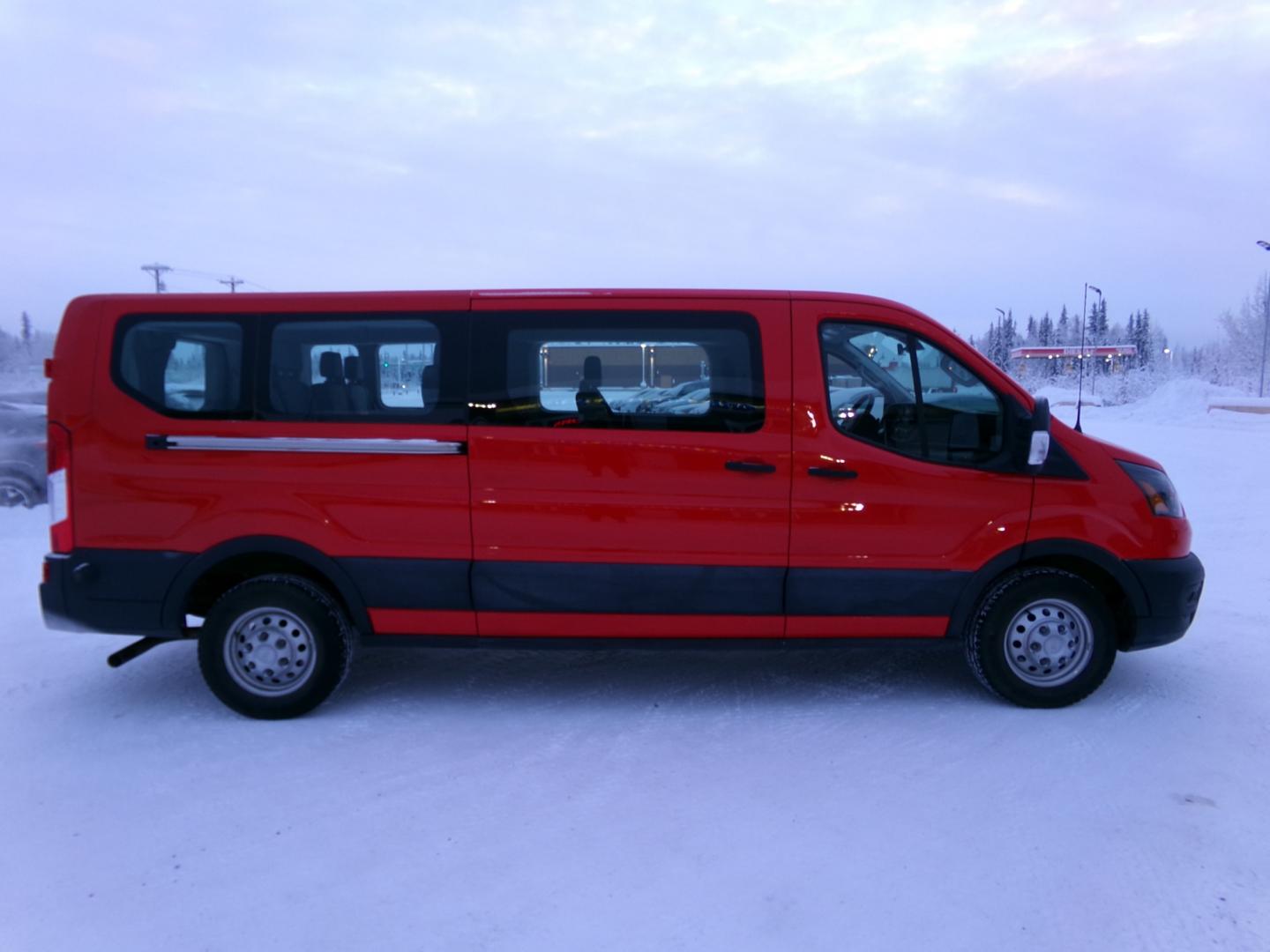 2021 Red Ford Transit (1FBAX9Y89MK) with an 3.5L V6 DOHC 24V engine, 6-Speed Automatic transmission, located at 2630 Philips Field Rd., Fairbanks, AK, 99709, (907) 458-0593, 64.848068, -147.780609 - Photo#2
